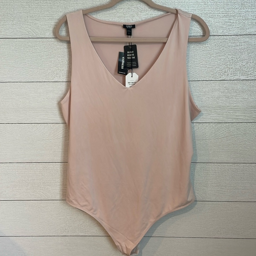 Express Women's light pink body contour compression bodysuit size XL NWT!